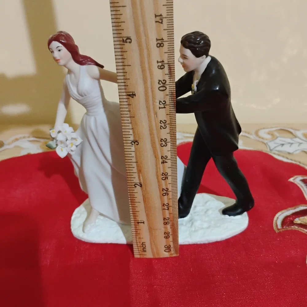 Elegant Wedding Cake Topper with Bride and Groom